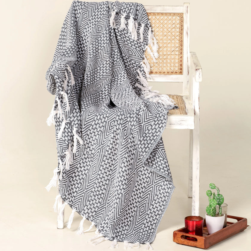 130x180cm decoraief plaid on a wooden chair - Urbane Hide