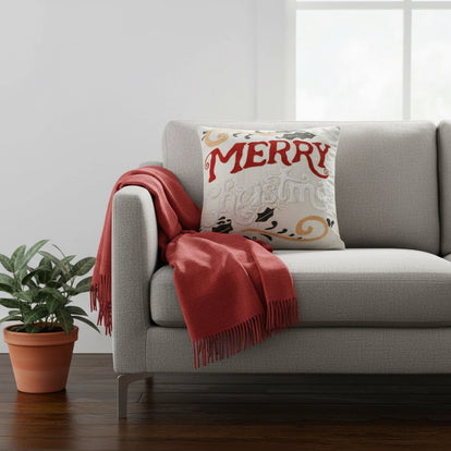 Kerstkussen met luxe borduursel en feestelijke tekst – Urbane Hide 