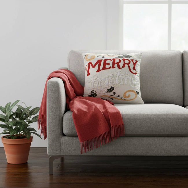 Kerstkussen met luxe borduursel en feestelijke tekst – Urbane Hide 