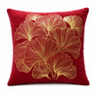 Kerstkussen rood fluweel met goud metallic ginkgo print